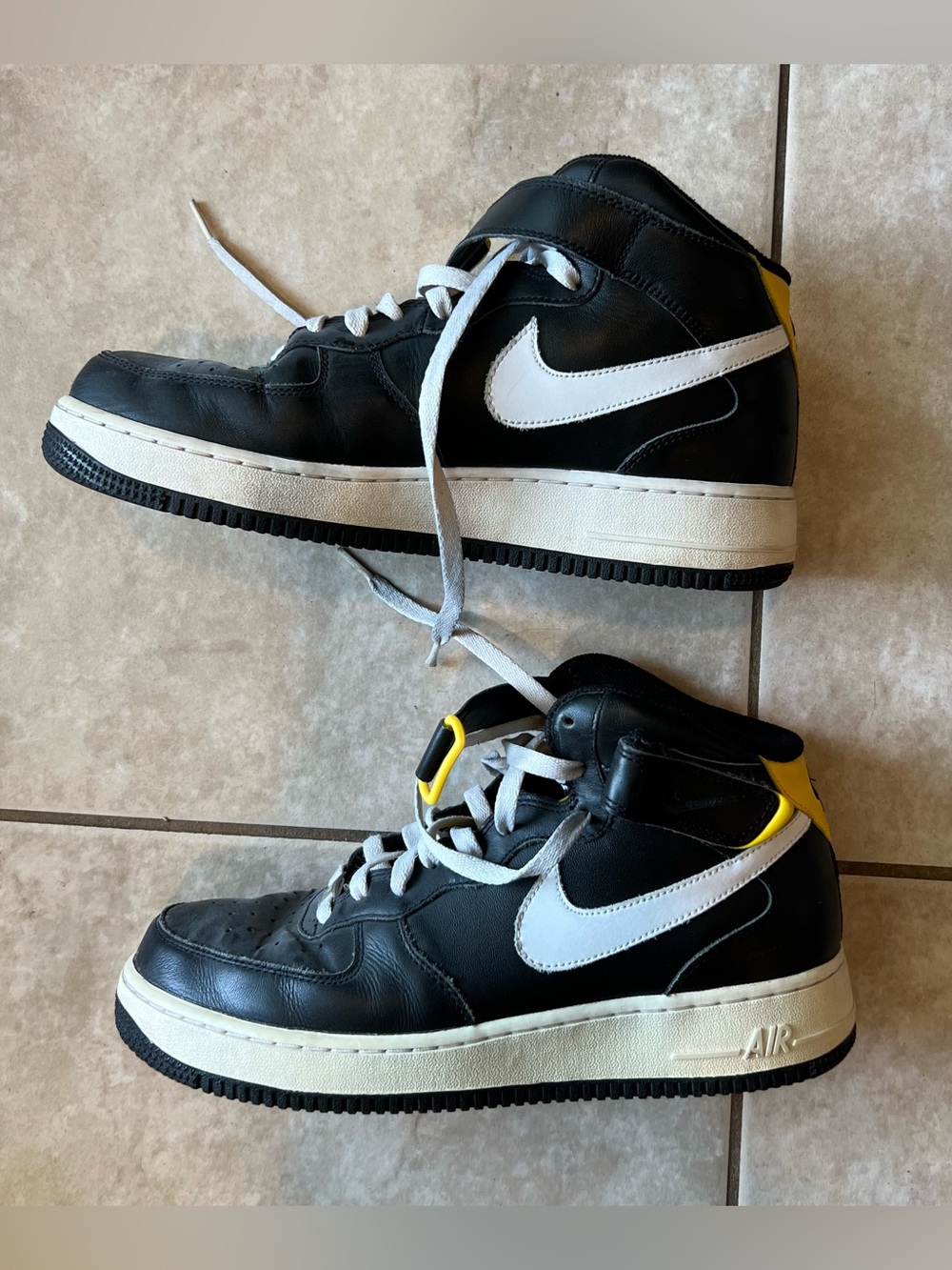 Nike Black & White High-Top Sneakers with Yellow Accents